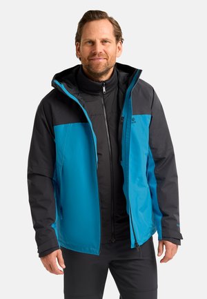 Herrenjacke mit blauem Oberteil und schwarzen Akzenten, ausgestattet mit einem Reißverschluss, verstellbarer Kapuze und strukturiertem Material für Wasserbeständigkeit.