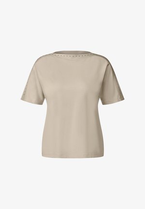Beige kortærmet t-shirt med rund halsudskæring og metalnitter langs sømmene på skuldrene, lavet af blød, glat stof.