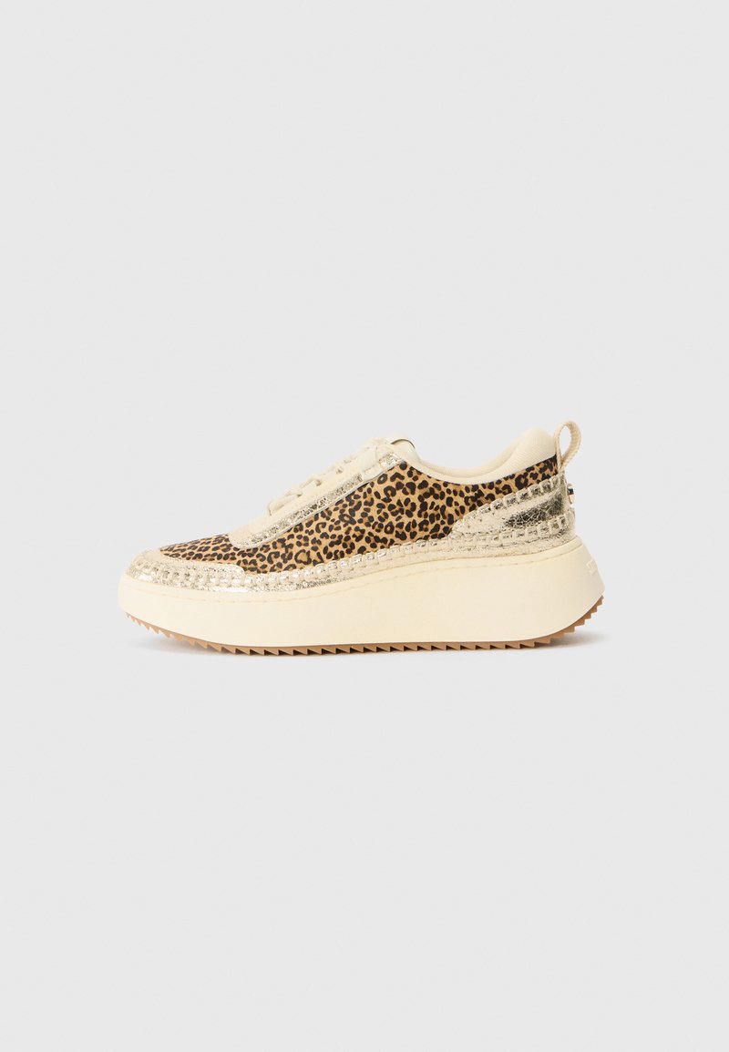 Leopard-print sneaker featuring a beige textile upper, gold accents, and a thick, textured sole with a serrated edge.