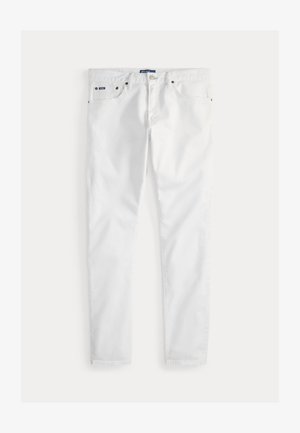 Vita jeans med raka ben i denim, med fem fickor, metallknappsstängning och subtila sömnadsdetaljer längs sömmarna.