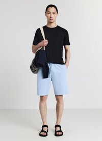 Calliope GINNICO - Pantaloni sportivi - carta da zucchero chiaro