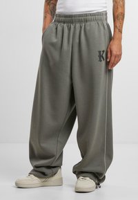 Karl Kani KK OS SIDESTRIPE - Trousers - grey