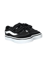 Zapatillas en blanco y negro con un upper de gamuza y lona, que cuentan con dos correas de Velcro, costuras blancas y una suela de goma texturizada blanca.