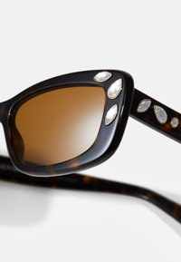 Swarovski Akiniai nuo saulės - brown