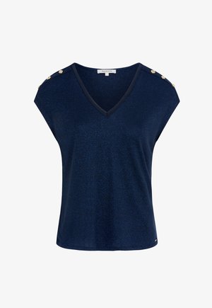 Tummansininen hihaton paita V-kauluksella ja koristeellisilla kultaisilla napeilla olkapäillä, jossa on hienovarainen hohtava kangas.