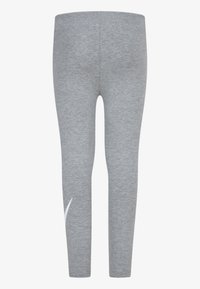Leggings cinzas em algodão com uma textura suave, design ajustado e um detalhe branco próximo à barra.