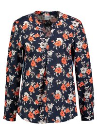 Blusa floreale a maniche lunghe di colore blu navy con motivi di fiori rossi e bianchi. Scollatura a V e vestibilità rilassata. Tessuto morbido con una leggera texture.