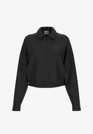 Giacca nera con zip, colletto, maniche lunghe e sottile logo Guess ricamato sul petto a sinistra.