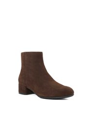 Brown suede ankle boot with a rounded toe and a block heel. Smooth texture and seamless design, suitable for versatile styling.