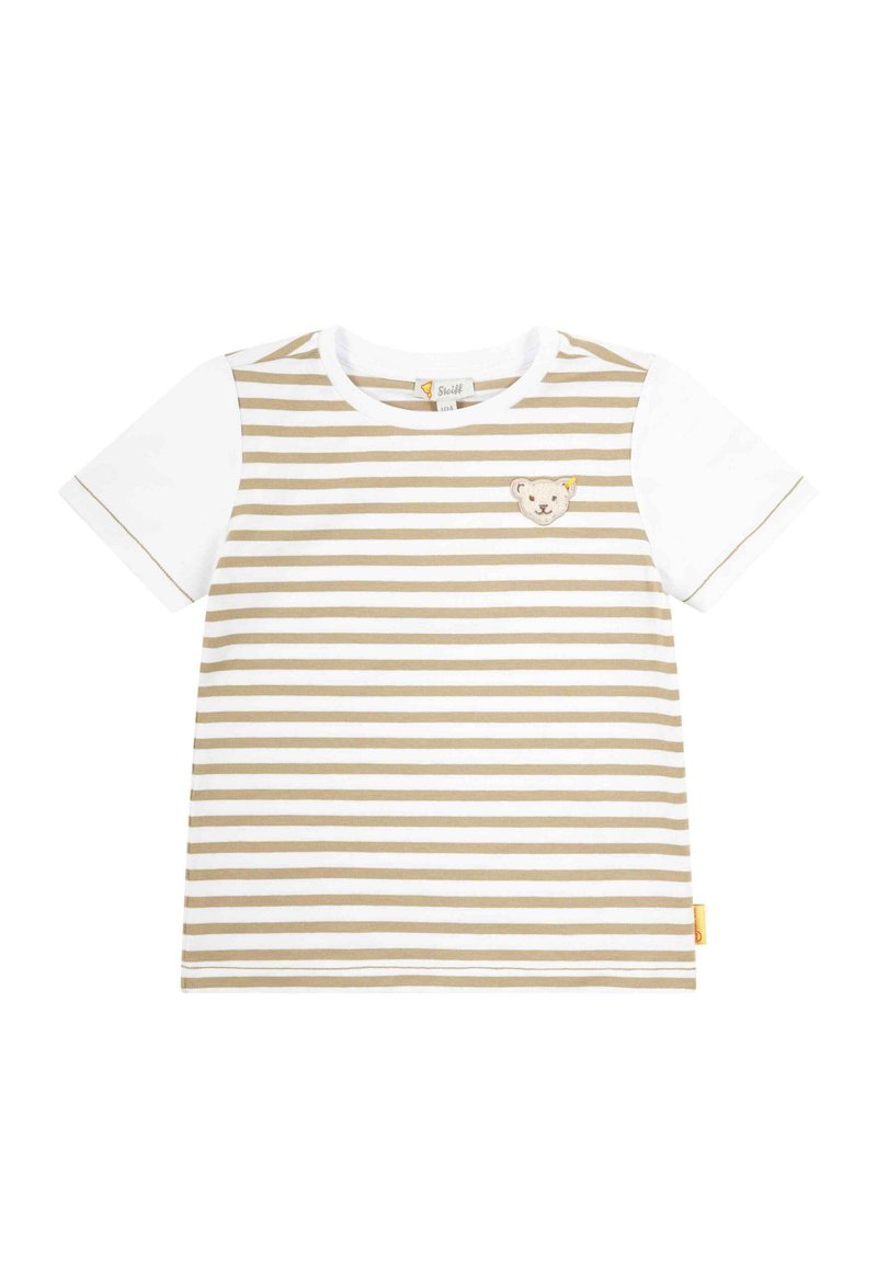 Camiseta de manga corta con un patrón de rayas en beige y blanco. Presenta un aplique de cara de oso en el pecho y una etiqueta amarilla en el lateral.