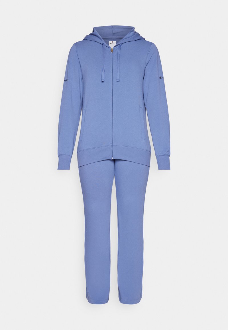 Felpa con cappuccio azzurro chiaro e pantaloni della tuta coordinati, realizzati in tessuto morbido. La felpa presenta una zip frontale, stringhe e tasche laterali.
