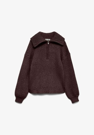 Pohjaväriltään tummanruskea neulottu vetoketjullinen neulepaita, jossa on resoroitu kaulus ja runko, leveät hihat sekä lyhyt leikkaus. Koko vaatteen pinnassa on tekstuuri.