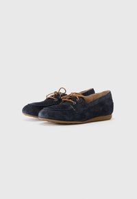 Navy suede lace-up shoes with a rounded toe, contrasting brown laces, and a flexible gum sole. Soft texture with minimal detailing.