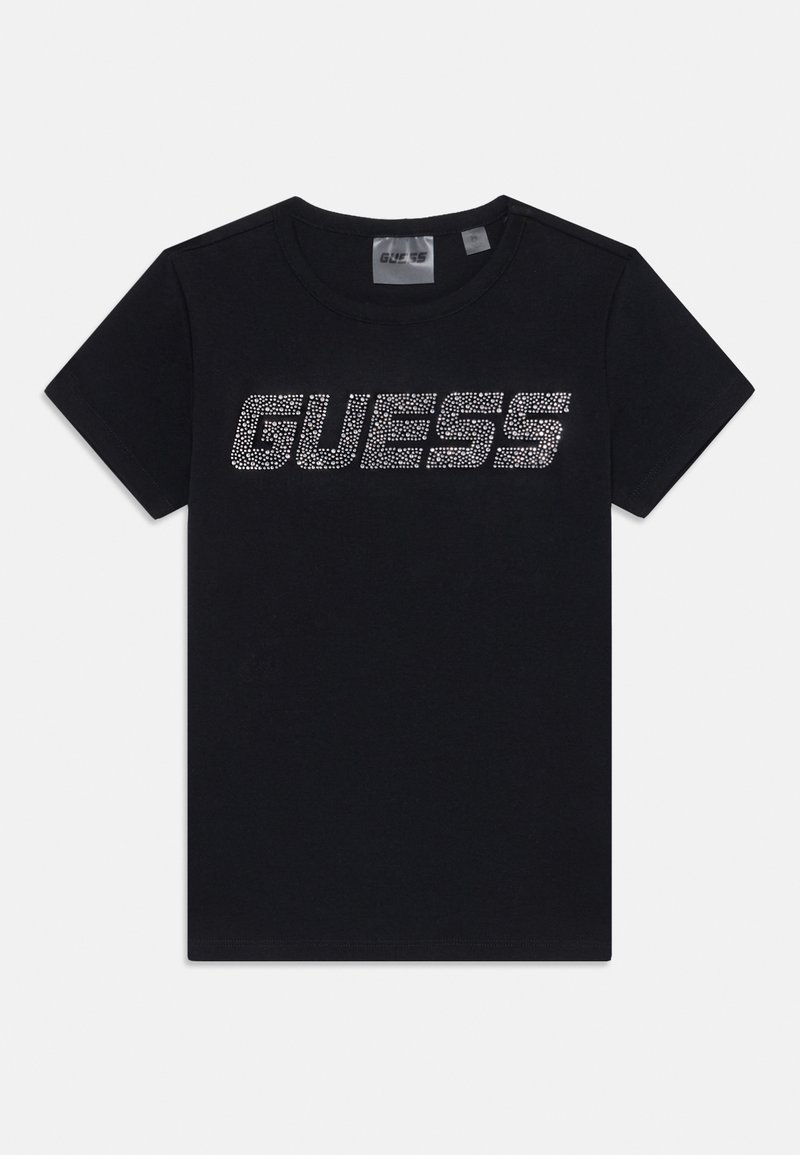 Juodas trumpomis rankovėmis medvilninis marškinėlis su dideliu blizgučių "GUESS" logotipu per krūtinę. Klasikinio apvalaus kaklo dizainas.