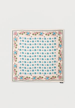 Neliöhuivi, jossa keskellä pieniä sinisiä kukkia ja suurempia vaaleanpunaisia ja sinisiä kukkakuvioita kermanvärisen reunuksen ympärillä.