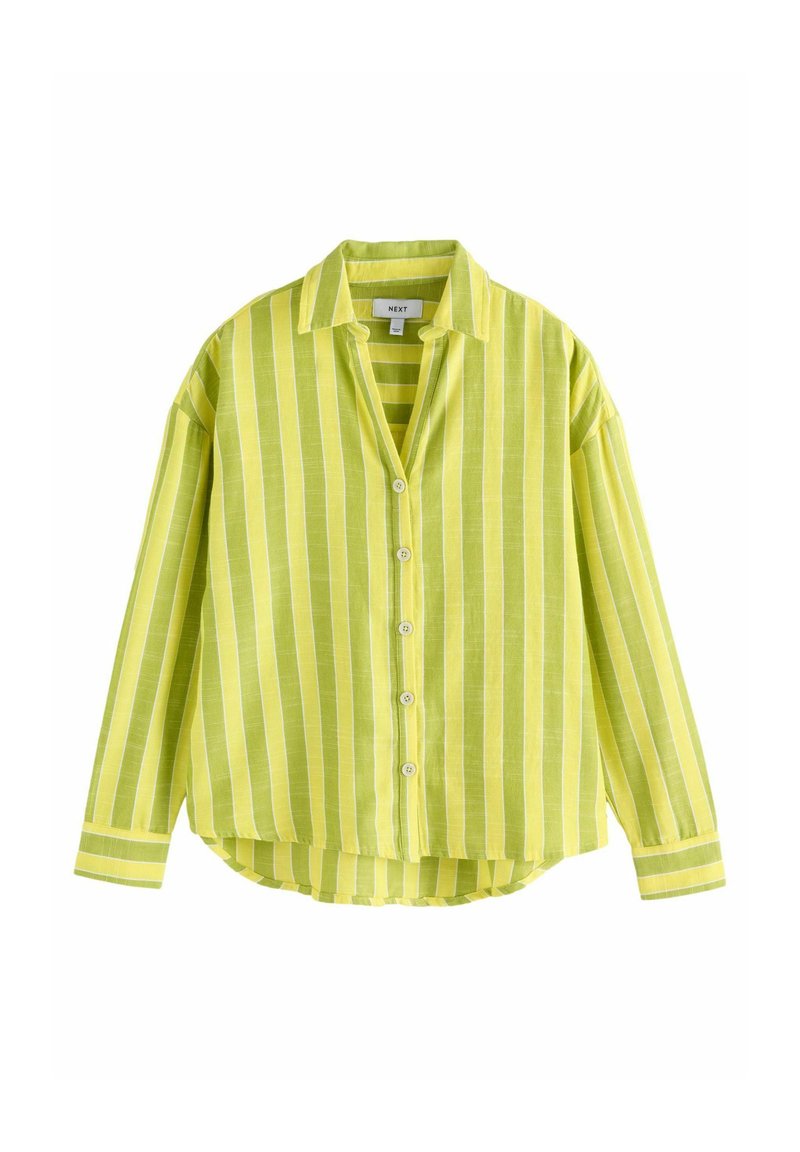 Camicia a maniche lunghe di un luminoso giallo con strisce verticali bianche, apertura con bottoni, colletto e orlo curvo. Realizzata in tessuto leggero.