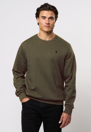 Olijfgroen sweatshirt met lange mouwen, ribgebreide hals en een klein zwart logo op de borst. Gemaakt van zachte stof, met een relaxte pasvorm.