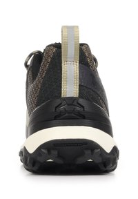 Vue arrière d'une chaussure de randonnée noire et beige avec une semelle texturée, une bande réfléchissante sur la languette du talon et un marquage TimberGrip sur la semelle.