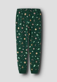 Groene pyjamabroek van zachte stof, met een all-over print van kerstbomen, cadeaus, peperkoekenhuisjes en zuurstokken, en een elastische tailleband.