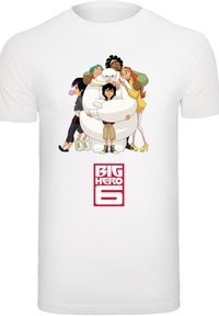 White T-shirt featuring a colorful graphic of characters from "Big Hero 6", including a large white character and five others grouped around it.