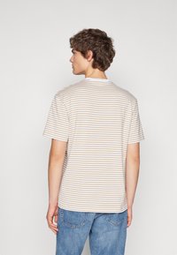 Lacoste Triko s potiskem - viennese/white