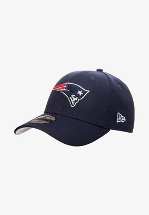 Navy blue baseball cap with an embroidered Patriots logo in white and red on the front. Features a curved brim and textured fabric.