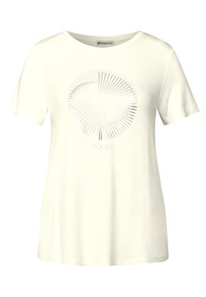 T-shirt bianco a maniche corte realizzato in tessuto morbido, con un design grafico metallico circolare e la parola "SOLEIL" sotto di esso.