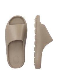 Beiga slip-on sandaler i mjuk plast, med öppen tå, låg klack och strukturerad gummisula för bra grepp.