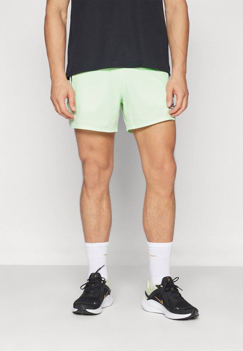 Nike Performance SECONDSUNRISE - Kurze Sporthose - vapor green/black