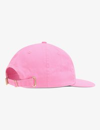 Pink cotton baseball cap with a curved brim, adjustable strap, and metallic hardware. Smooth texture, simple design, and no visible patterns.