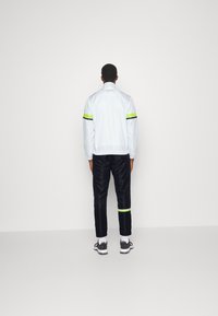 Sergio Tacchini CRYO TRACKSUIT SET - Treniņtērps - white/lime green