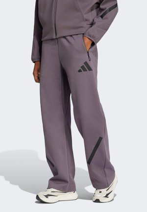 adidas Sportswear Z.N.E. BARREL LOOSE - Tracksuit bottoms - grey strata