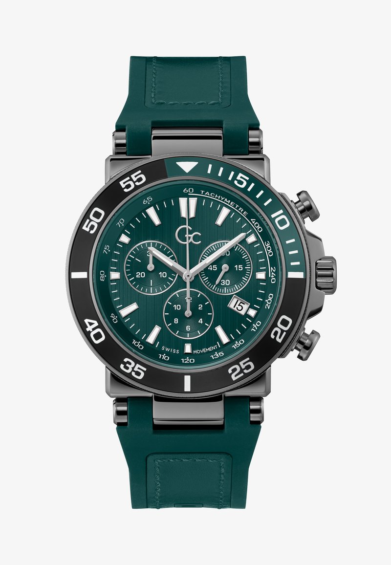 Zelené chronografické hodinky s texturovaným ciferníkem, pouzdrem z nerezové oceli a černým rámečkem. Gumový pásek a stříbrné akcenty umocňují moderní design.