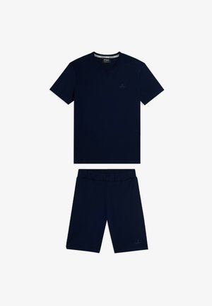 Camiseta de algodón azul marino de manga corta con cuello en V y pantalones cortos a la rodilla a juego. Ambos artículos presentan un branding mínimo en impresión oscura.