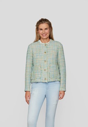 Textured, multi-colored tweed jacket in pale blue with yellow and green accents. Features a round neckline and gold buttons.