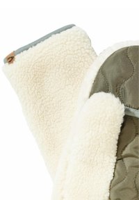 Fleece-lined mittens featuring a cream color with a soft texture, quilted olive green fabric, and a gray edge trim. Leather logo detail present.