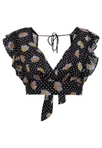 Haut court noir à pois blancs, imprimé marguerite jaune, manches à volants, décolleté en V profond et fermetures à nouer au devant et à l'arrière.