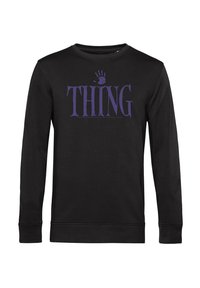 Černá mikina s dlouhým rukávem a fialovým textem "THING" a designem dlaně umístěným na hrudi.