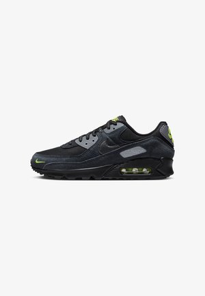 Černé a šedé tenisky Nike Air Max 90 z broušené kůže a síťoviny, se zelenými akcenty, viditelnou vzduchovou jednotkou a detailním prošitím.