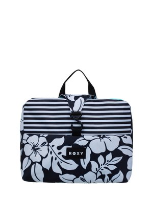 Sac de voyage rectangulaire noir et blanc avec des motifs floraux et rayés, une poignée de transport, une boucle noire et le logo "ROXY" sur la poche avant.