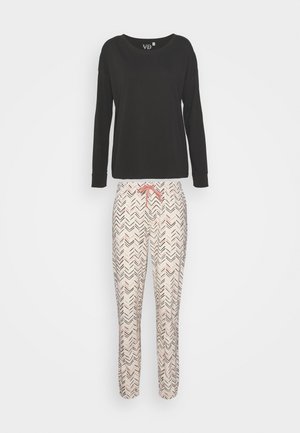 Mustro mustade pika varrukatega pluus koos kreemika värvi pükstega, millel on roosa ja musta diagonaalmustritega. Pehme kangas, millel on mugav lõige ja reguleeritav vöökoht.