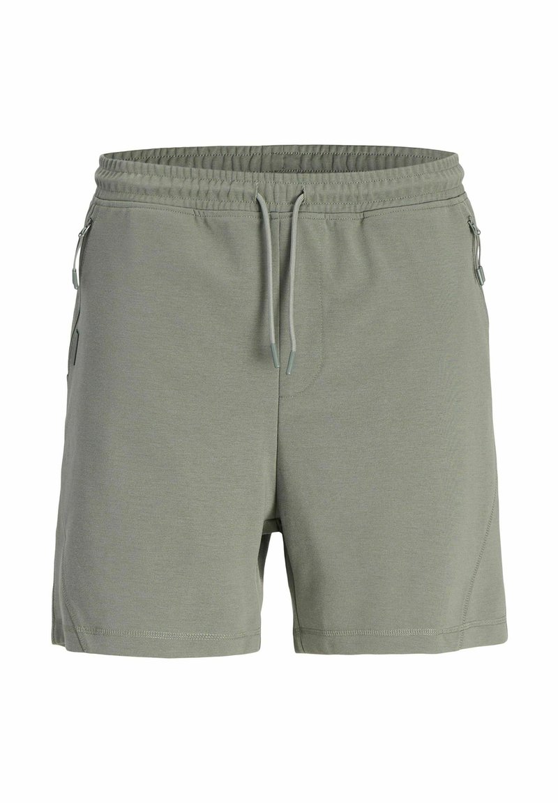 Shorts de sport vert clair avec une taille élastique, un cordon de serrage ajustable, des poches latérales et un tissu lisse et texturé.