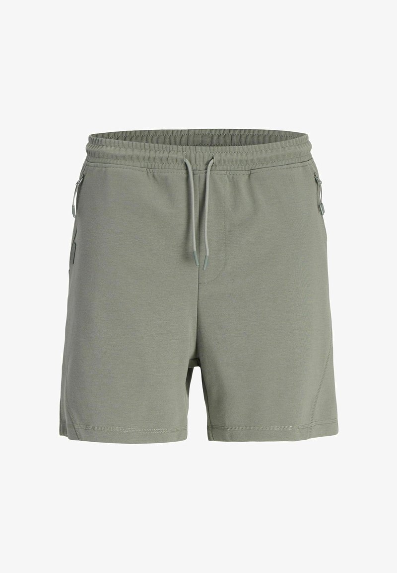 Shorts de sport vert clair avec une taille élastique, un cordon de serrage ajustable, des poches latérales et un tissu lisse et texturé.