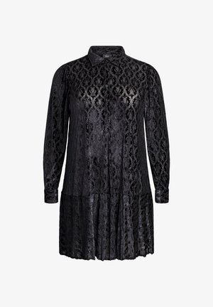 Melnas garām piedurknēm kleita ar mežģīņu rakstu, ar pogām priekšā, apkakli un pakāpenisku apakšdaļu. Izgatavota no spīdīgas, teksturētas auduma.