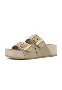 Beige suède platform sandale s dva podesiva zlatna kopčanja i teksturiranom površinom. Potplat je napravljen od gume za stabilnost.