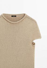 Beige knitted short-sleeve sweater with round neckline and textured stitch pattern shown on a white background.