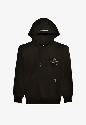 Hanorac negru cu buzunar frontal tip cangur, șnururi și text brodat "1988 PAS DE MONACO" și "Atelier Racing" în aur. Textură netedă.