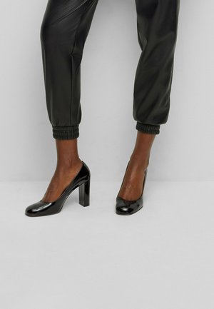 Korolliset avokkaat - black