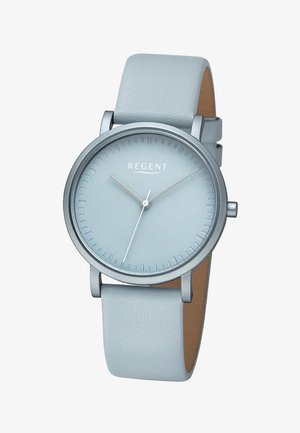 Montre-bracelet minimaliste bleu clair avec bracelet en cuir, boîtier argenté et trois aiguilles fines indiquant l'heure à 10:10:35.