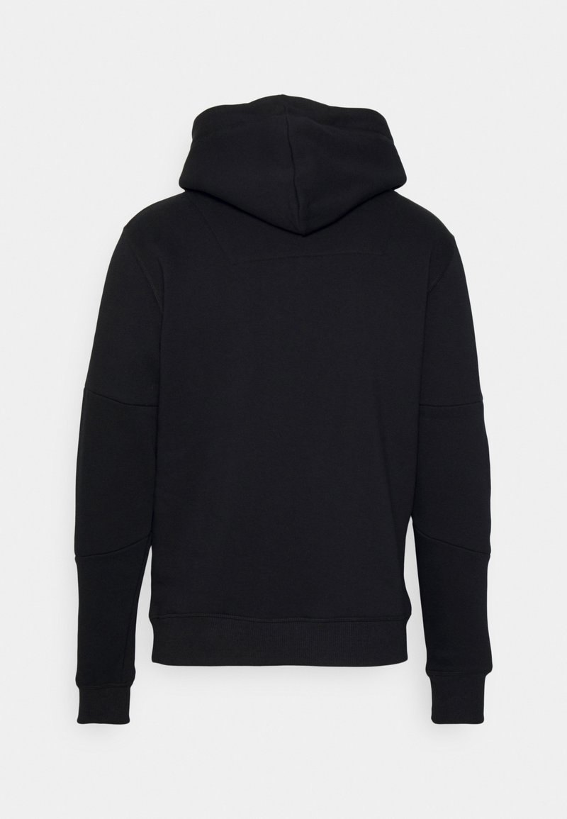 Felpa nera con cappuccio, maniche lunghe, coulisse, polsini e orlo a coste. Presenta una consistenza liscia e dettagli cuciti minimi. Vista posteriore.